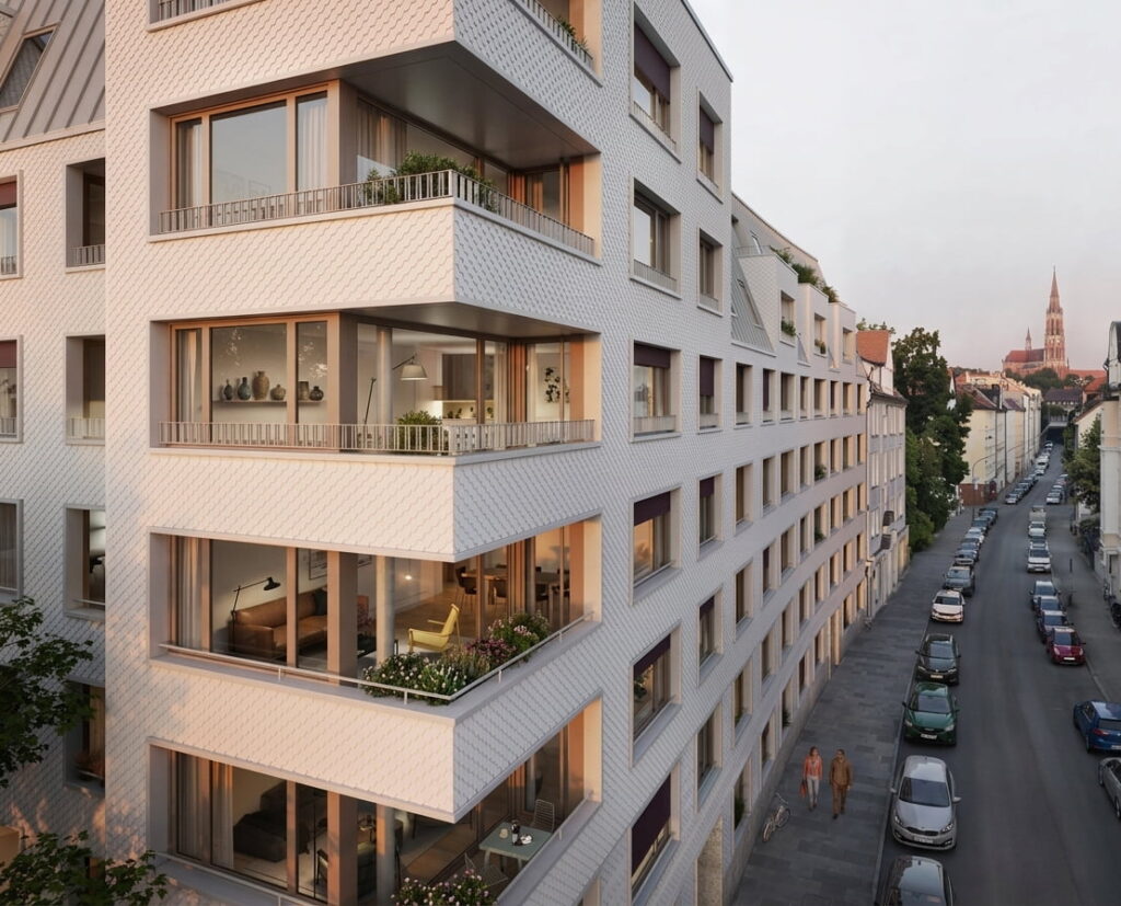 Mehrstöckiges modernes Wohngebäude mit großen Fenstern an einer ruhigen Straße in Untergiesing